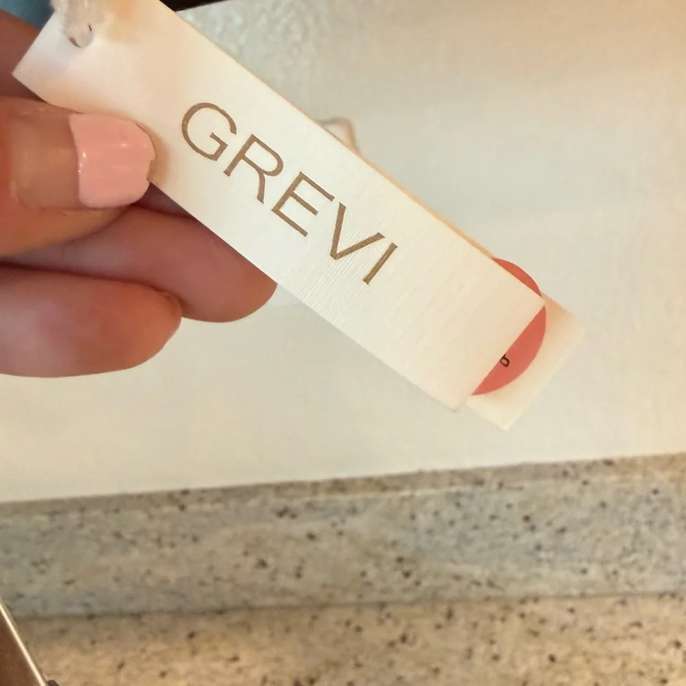 Grevi Hat Tag with Soft Pink Accent